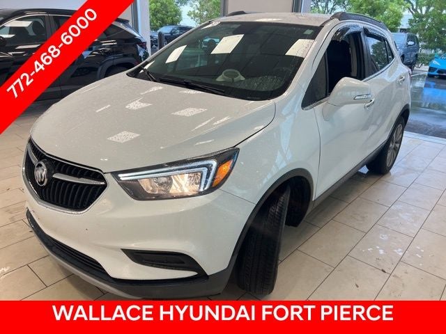 2019 Buick Encore Preferred in Summit White — front three-quarter view