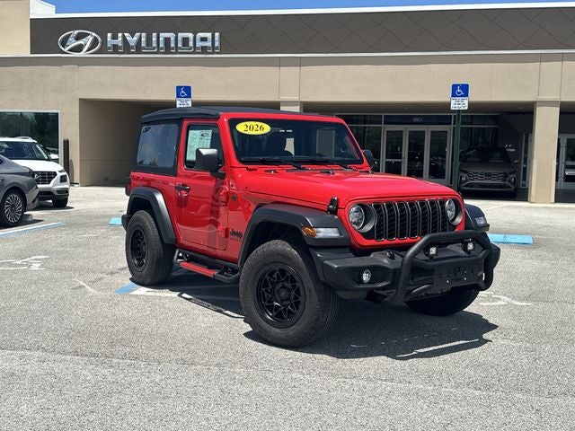 2026 Jeep Wrangler Sport in Firecracker Red Clearcoat — front three-quarter view