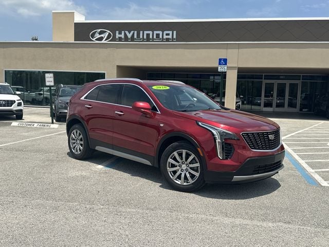 2020 Cadillac XT4 Premium Luxury in Red Horizon Tintcoat — front three-quarter view