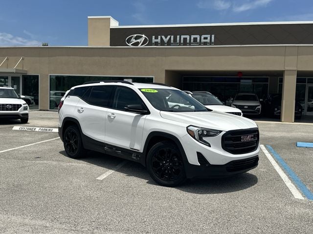 2019 GMC Terrain SLE in Summit White — front three-quarter view