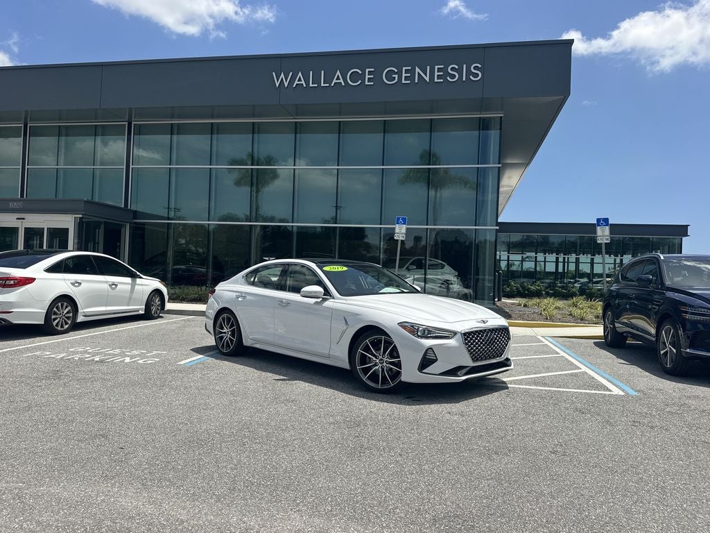 2019 Genesis G70 2.0T Advanced in Casablanca White — front three-quarter view
