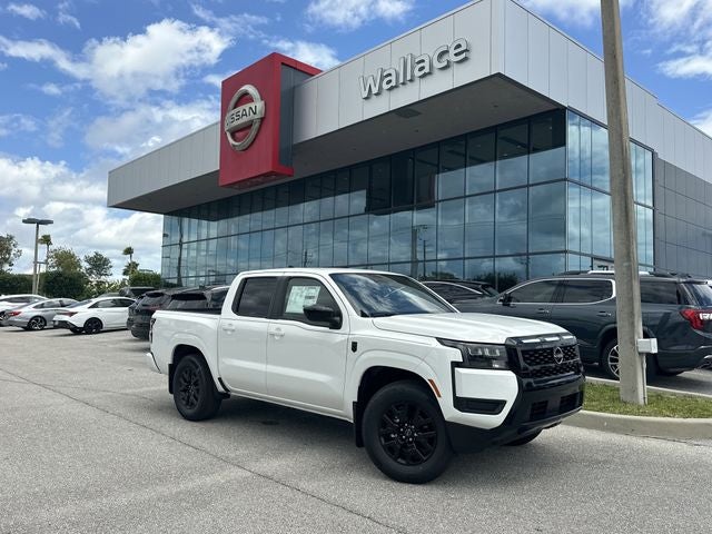 2026 Nissan Frontier SV in Glacier White — front three-quarter view