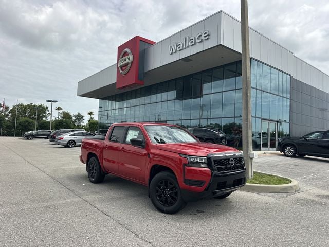 2026 Nissan Frontier SV in Red Alert — front three-quarter view
