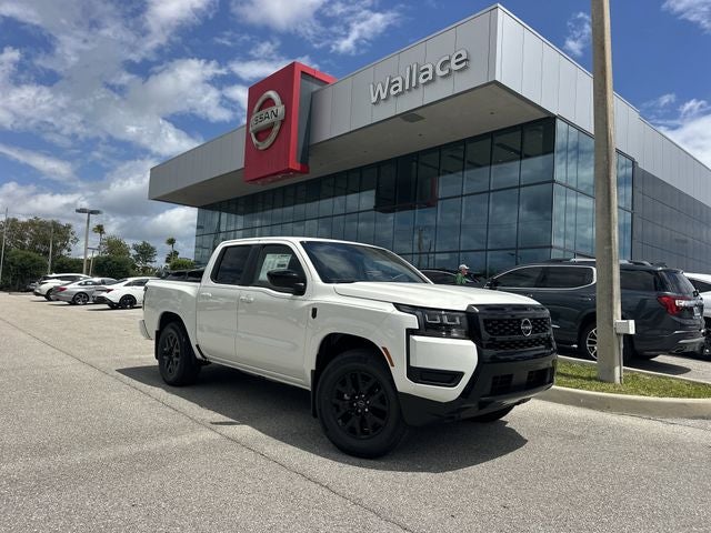 2026 Nissan Frontier SV in Glacier White — front three-quarter view