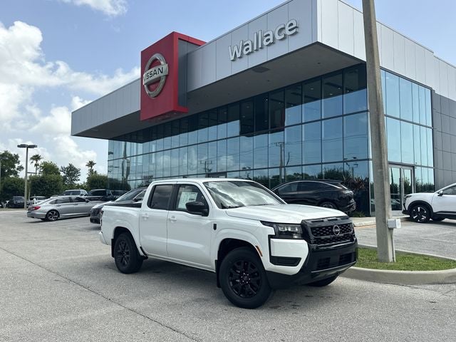2026 Nissan Frontier SV in Glacier White — front three-quarter view