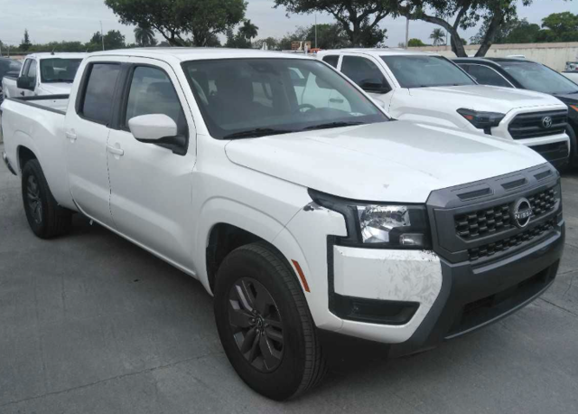 2025 Nissan Frontier SV in Glacier White — front three-quarter view