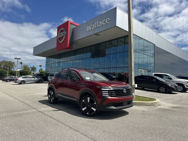 2026 Nissan Kicks SR in Scarlet Ember Tintcoat — front three-quarter view