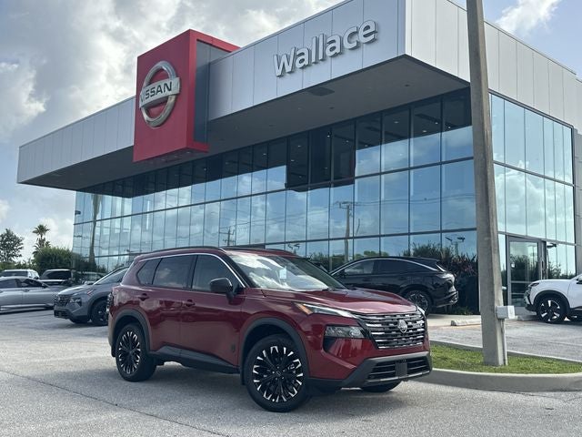 2026 Nissan Rogue Dark Armor in Scarlet Ember Tintcoat — front three-quarter view