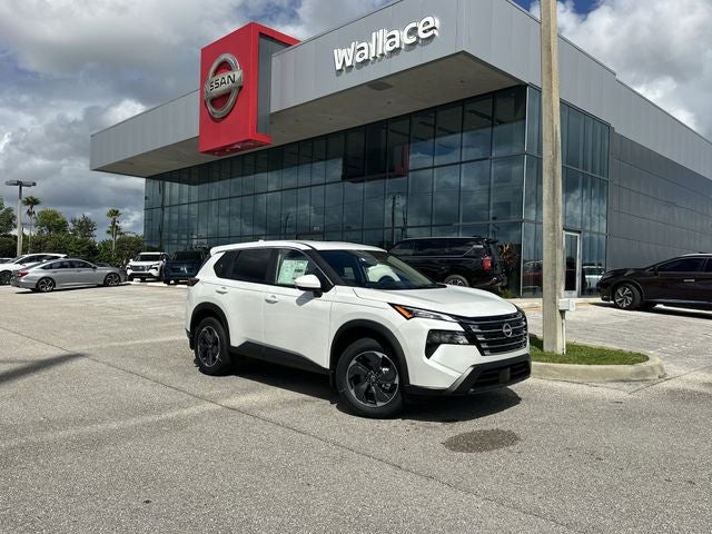 2026 Nissan Rogue SV in Everest White Pearl Tricoat — front three-quarter view