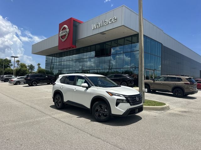 2026 Nissan Rogue SV in Everest White Pearl Tricoat — front three-quarter view