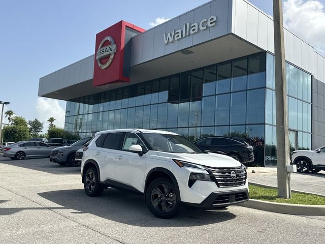 2026 Nissan Rogue SV in Everest White Pearl Tricoat — front three-quarter view