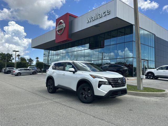 2026 Nissan Rogue SV in Everest White Pearl Tricoat — front three-quarter view