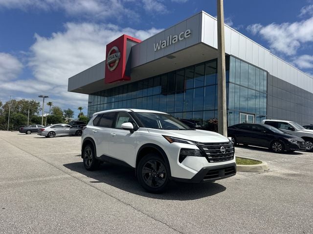 2026 Nissan Rogue SV in Everest White Pearl Tricoat — front three-quarter view