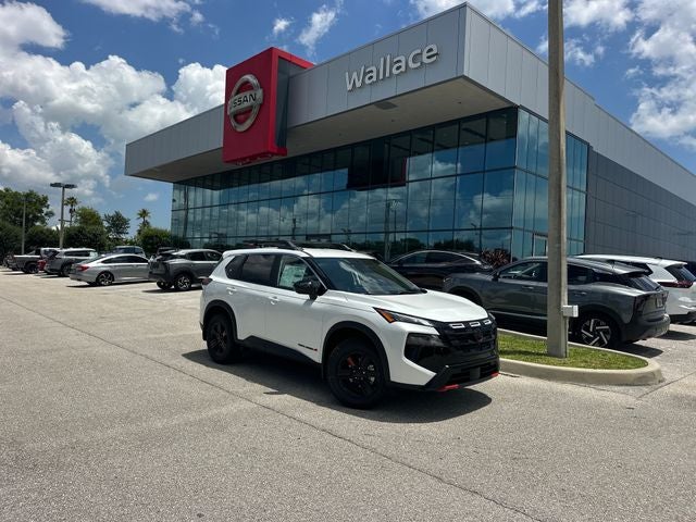2026 Nissan Rogue Rock Creek in Everest White Pearl Tricoat — front three-quarter view
