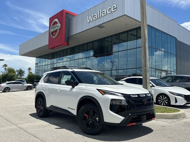 2026 Nissan Rogue Rock Creek in Everest White Pearl Tricoat — front three-quarter view