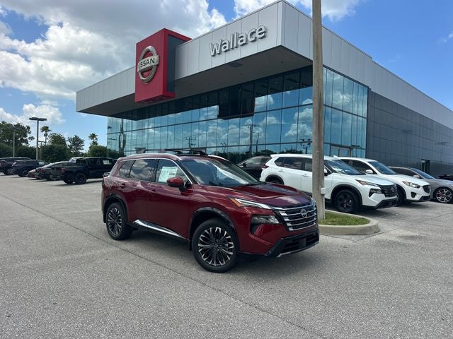 2026 Nissan Rogue Platinum in Scarlet Ember Tintcoat — front three-quarter view