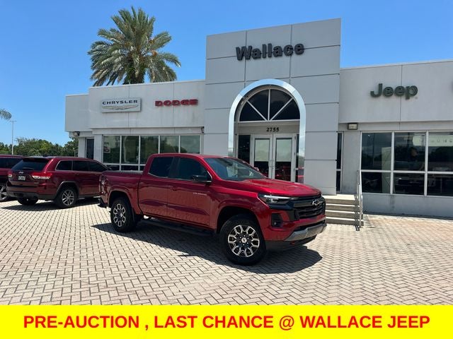 2024 Chevrolet Colorado Z71 in Radiant Red Tintcoat — front three-quarter view