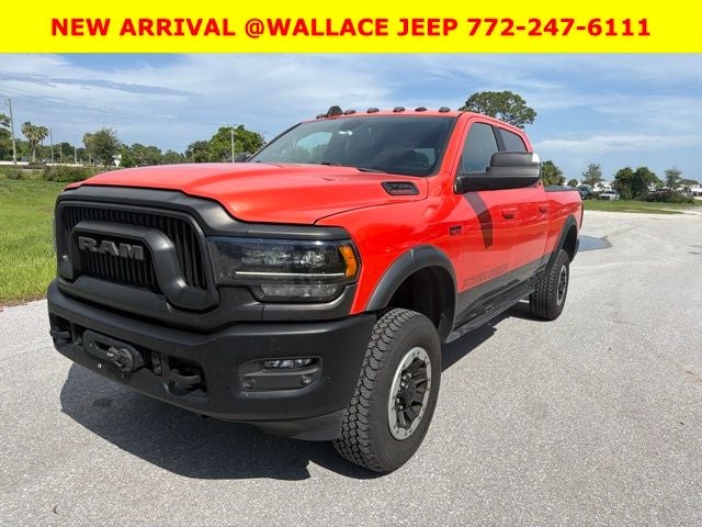 2021 RAM 2500 Power Wagon in Go Mango — front three-quarter view