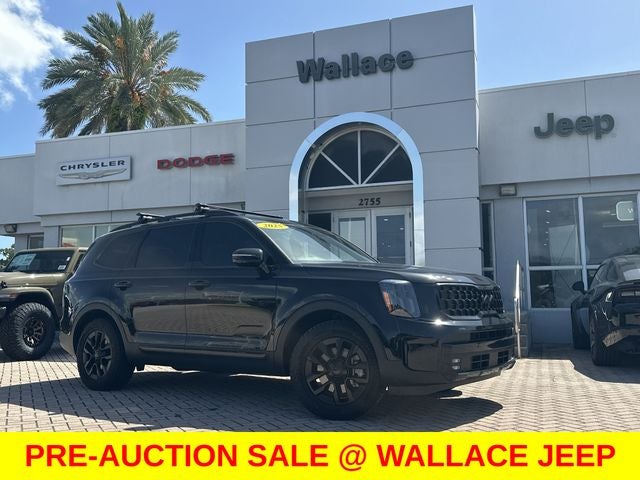 2025 Kia Telluride SX-Prestige X-Pro in Ebony Black — front three-quarter view
