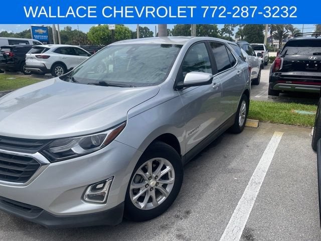 2021 Chevrolet Equinox LT in Silver Ice Metallic — front three-quarter view
